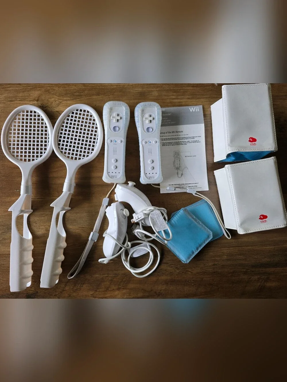 Lot of Nintendo Wii Console + 2 Remotes Nunchucks Tennis Rackets + 9 Video Games